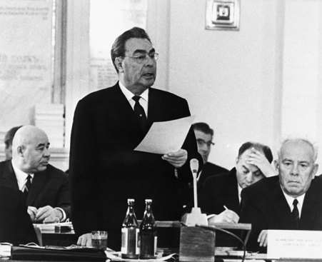 June 7, 1969: Soviet Communist Party leader Leonid Brezhnev addresses the World Conference of Communist Parties in Moscow. In his speech, Brezhnev accused Red China of planning nuclear and conventional war against the Soviet Union. USSR Premier Alexei Kosygin, left, and President Nikolai Podgorny listen to his statement. | Photos: Bettmann/CORBIS; source: wired.com | Click for image.